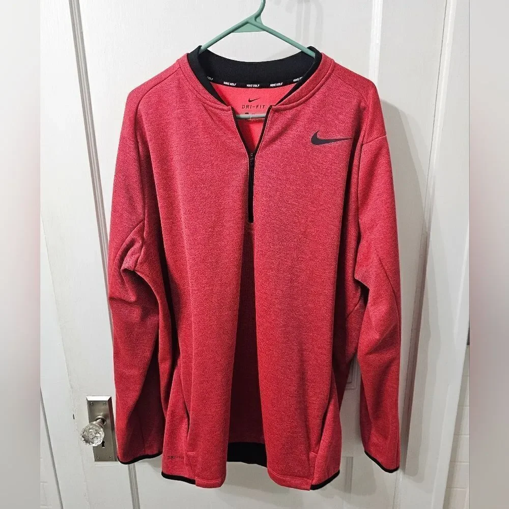 Nike golf 1/4 zip pullover over. Salmon color with black. XXL,  excellent condit